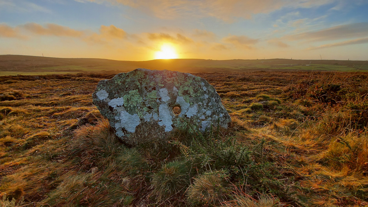 Autumn dawn over holed stones by Carolyn Kennett